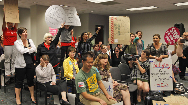 Protesters appeal to members of the Virginia Board of Health after their decision to impose new building regulations on abortion clinics in Richmond, Va., on Sept. 14.