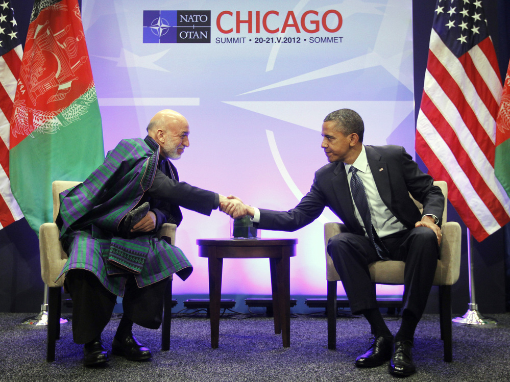 President Obama and Afghan President Hamid Karzai greet each other during a May 20 meeting at the NATO Summit in Chicago. Karzai is in Washington, D.C., this week to meet Obama and other senior U.S. officials.