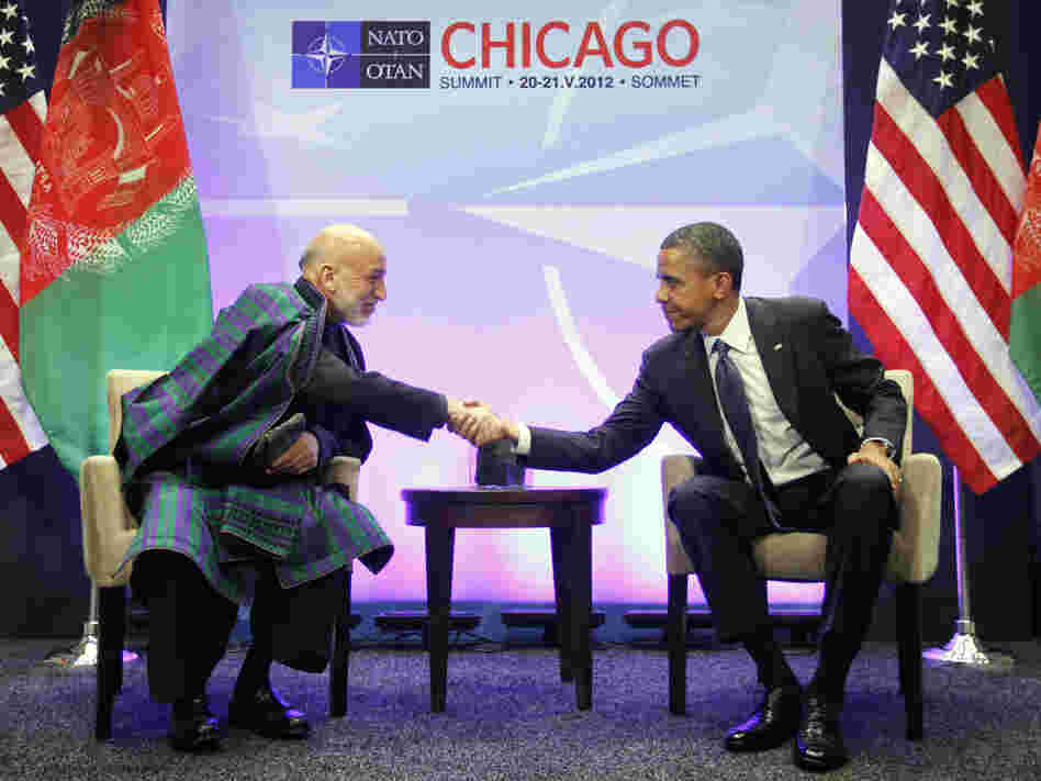 President Obama and Afghan President Hamid Karzai greet each other during a May 20 meeting at the NATO Summit in Chicago. Karzai is in Washington, D.C., this week to meet Obama and other senior U.S. officials.