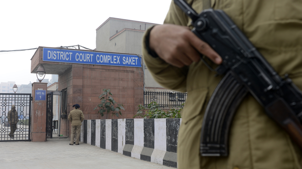 Inside the courthouse in New Delhi today, there were chaotic scenes leading up to a hearing for men accused in the rape and death of a young woman. Outside, Indian police stood watch. Inside the courthouse in New Delhi today, there were chaotic scenes leading up to a hearing for men accused in the rape and death of a young woman. Outside, Indian police stood watch.