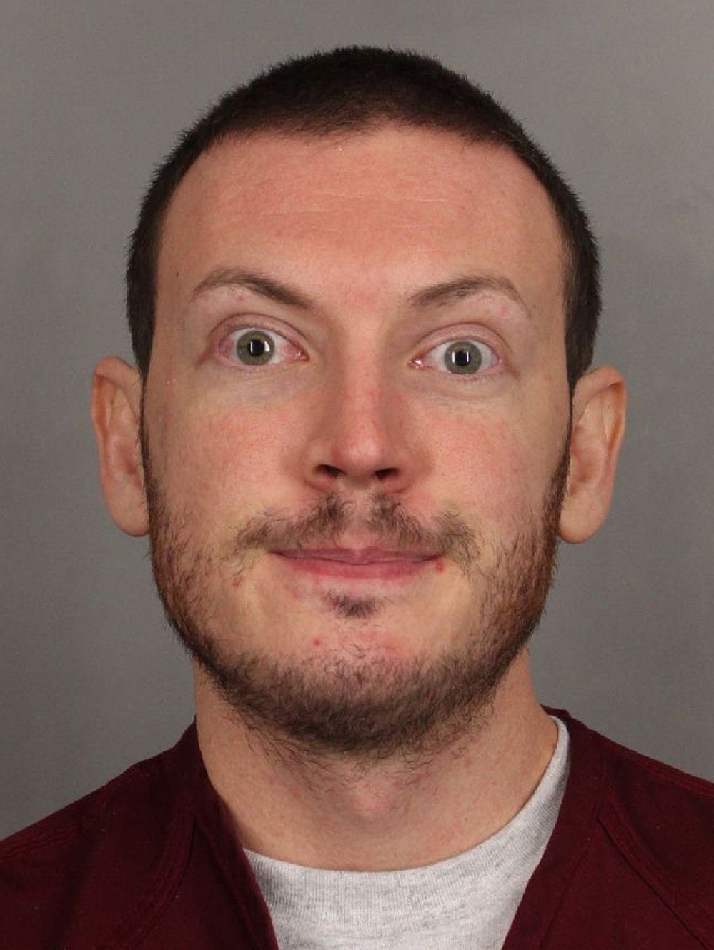 James Holmes faces multiple counts of first-degree murder and attempted murder in the July 20 theater shooting in Aurora, Colo. Here, he's seen in a photo from the Arapahoe County Sheriff's Office.