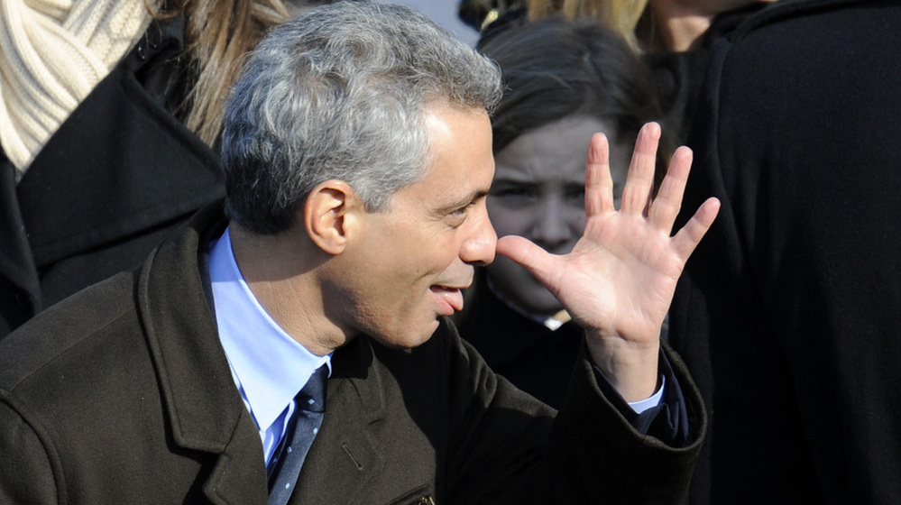 Incoming White House Chief of Staff Rahm Emanuel makes a face before President Barack Obama's inauguration in 2009. The person behind him does not look amused. Incoming White House Chief of Staff Rahm Emanuel makes a face before President Barack Obama's inauguration in 2009. The person behind him does not look amused.