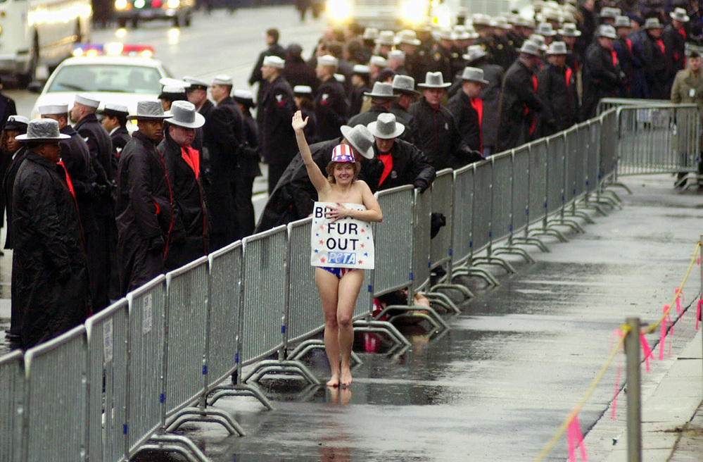 A topless protester braved the Washington, D.C., winter in 2001 during President George W. Bush's inaugural parade. A topless protester braved the Washington, D.C., winter in 2001 during President George W. Bush's inaugural parade.