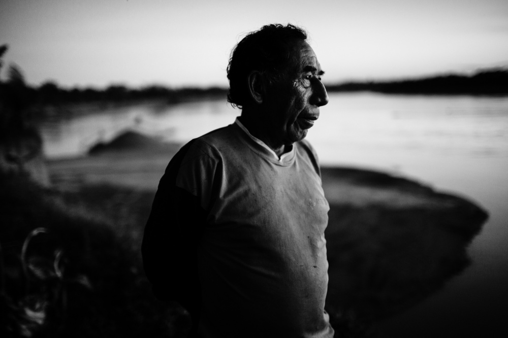 In the indigenous Shipibo-Conibo community of El Pilar, Manuel Saavedra surveys the devastation left behind by miners that invaded his property, where his family had planned to plant bananas.