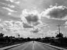 A man crosses the Interoceanic Highway near the Peru-Brazil border.