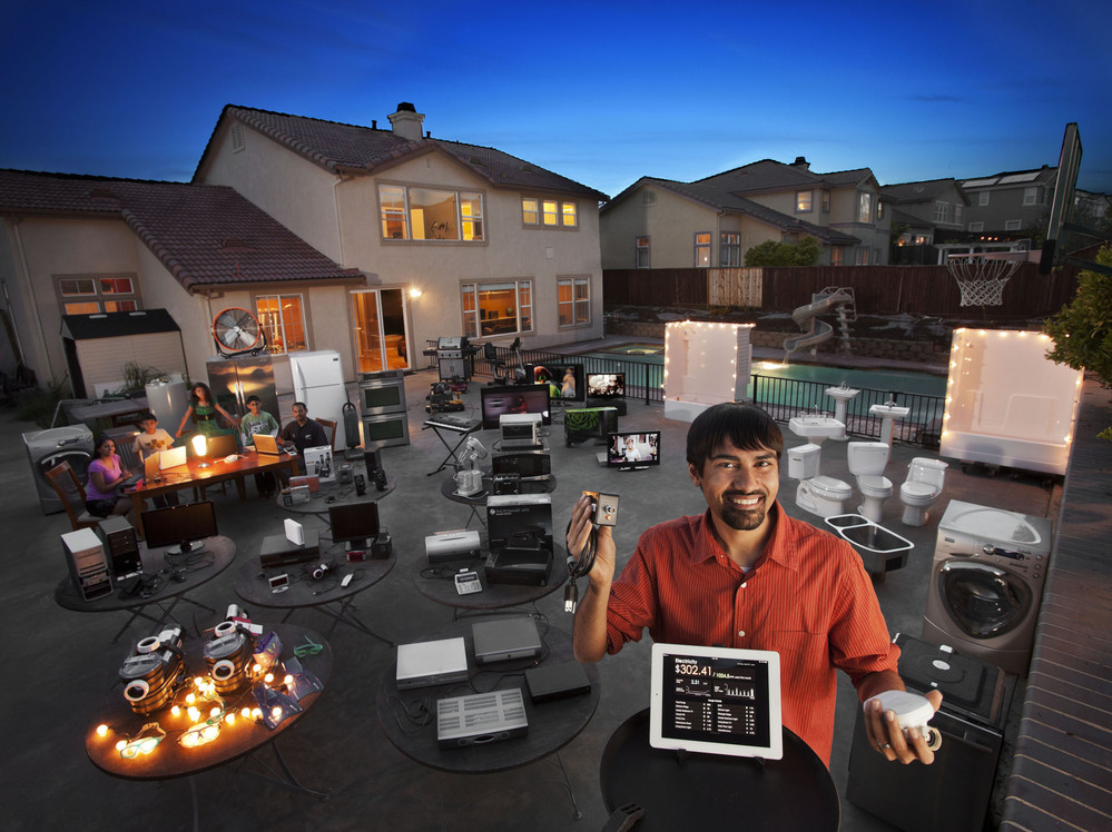 Shwetak Patel (foreground), a MacArthur Fellow, recognized that every device in a home has a unique signature that can be used to track energy usage. The data collected by Patel's system showed that digital video recorders were responsible for 11 percent of this home's power use, just one example of The Human Face of Big Data.