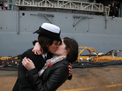 Dec. 21, 2011: Petty Officer 2nd Class Marissa Gaeta, left, kisses her girlfriend of two years, Petty Officer 3rd Class Citlalic Snell at Joint Expeditionary Base Little Creek in Virginia Beach, Va. Gaeta's ship had returned from 80 days at sea. Their "first kiss" that day was a first of its kind for the Navy. Dec. 21, 2011: Petty Officer 2nd Class Marissa Gaeta, left, kisses her girlfriend of two years, Petty Officer 3rd Class Citlalic Snell at Joint Expeditionary Base Little Creek in Virginia Beach, Va. Gaeta's ship had returned from 80 days at sea. Their "first kiss" that day was a first of its kind for the Navy.