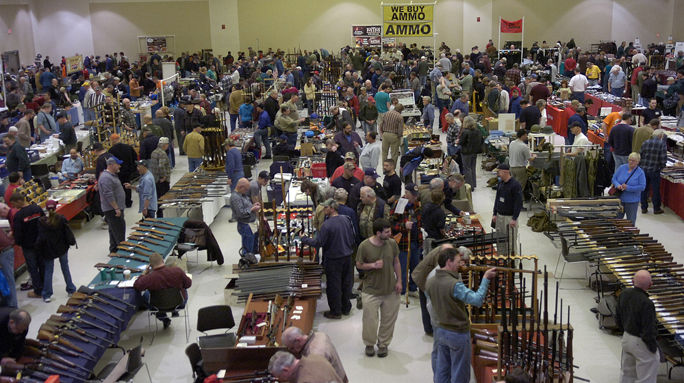Gun enthusiasts flock to the New Eastcoast Arms Collectors Associates Arms Fair in March 2012 in Saratoga, N.Y. Some local residents would like the next show to be canceled, in light of the Newtown, Conn., school shootings. Gun enthusiasts flock to the New Eastcoast Arms Collectors Associates Arms Fair in March 2012 in Saratoga, N.Y. Some local residents would like the next show to be canceled, in light of the Newtown, Conn., school shootings.