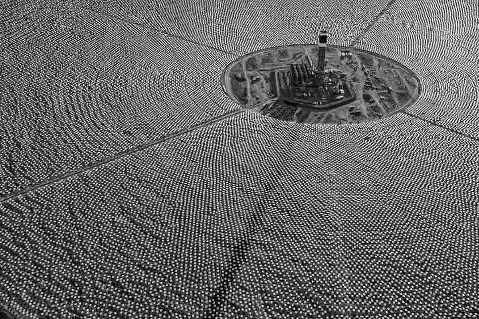 Completed tower for Solar Field One surrounded by thousands of heliostats. Eventually, they will send concentrated solar thermal energy to the top of the tower, superheating water to create steam and drive turbines. October 2012.