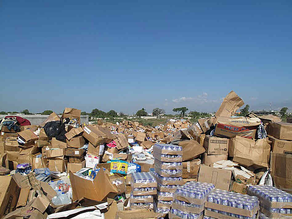 Unsolicited donations of used clothing, bottled water, canned food and personal grooming products piled up following the 2010 earthquake in Haiti. The piles had to be moved aside to make room to stage and deliver critical relief supplies.