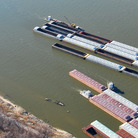 Barges last month crowded an area on the Mississippi River south of St. Louis where barges are stored, loaded and unloaded. Shippers worry that the drought-shrunken river could shut to barge traffic entirely this month.