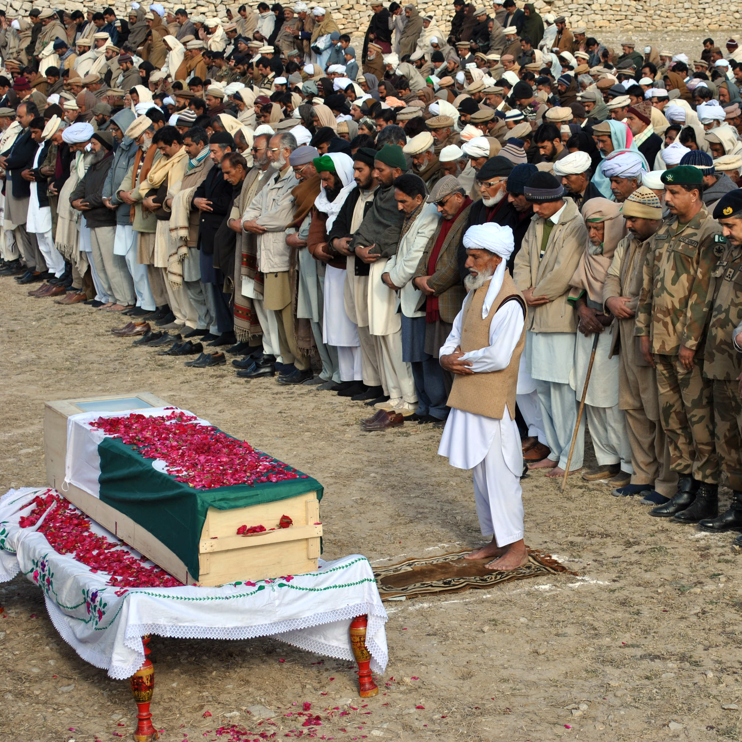 Tuesday in the Pakistani village of Khairpur, officials and relatives gathered at the coffin of the Pakistani soldier killed Sunday in a skirmish with Indian troops.
