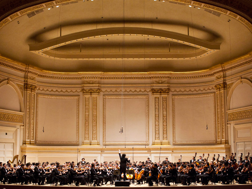 Gustavo Dudamel conducts Simon Bolivar Symphony Orchestra of Venezuela at Carnegie Hall.