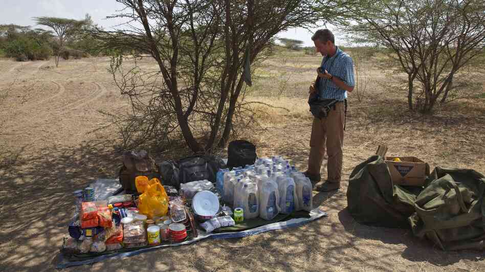Journalist Paul Salopek, shown here with his supplies in Ethiopia, is setting out on a seven-year walk that will take him to the tip of South America.