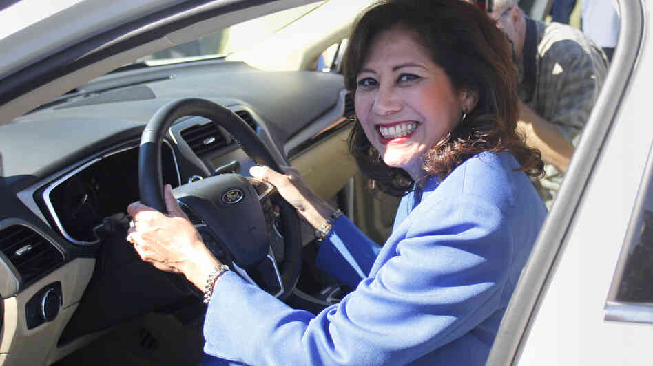 Secretary of Labor Hilda Solis, seen here sitting in a new Ford Fusion last September, submitted her resignation to President Obama Wednesday.