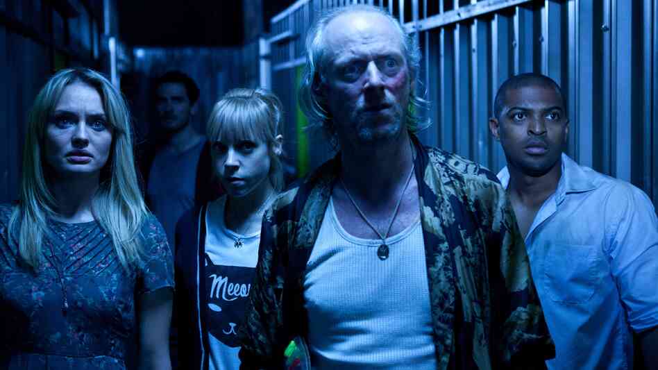 Shelley (Antonia Campbell-Hughes), Nikki (Laura Haddock), David (Ned Dennehy) and Charlie (Noel Clarke) are among a crew of trapped Londoners dealing with an otherworldly threat in the thriller Storage 24. Shelley (Antonia Campbell-Hughes), Nikki (Laura Haddock), David (Ned Dennehy) and Charlie (Noel Clarke) are among a crew of trapped Londoners dealing with an otherworldly threat in the thriller Storage 24.
