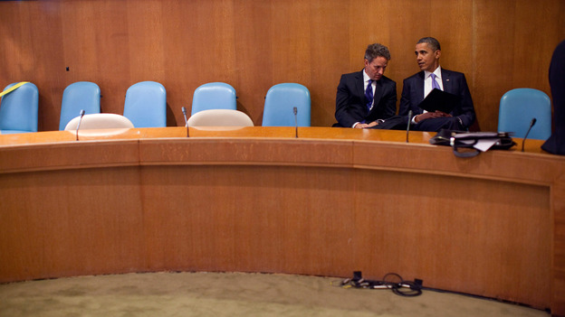 In this handout image provided by the White House, President Obama talks with Treasury Secretary Timothy Geithner at the United Nations on Sept. 23, 2010.