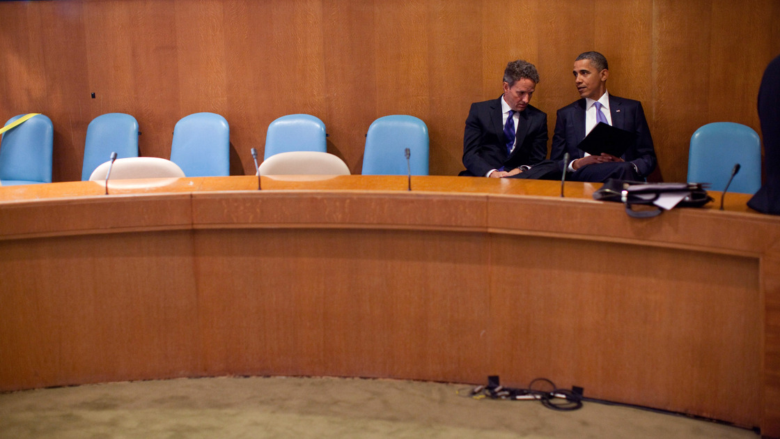 In this handout image provided by the White House, President Obama talks with Treasury Secretary Timothy Geithner at the United Nations on Sept. 23, 2010.