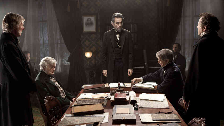 Daniel Day-Lewis (center) portrays Abraham Lincoln in the film Lincoln, which might leave audiences feeling a little more hopeful about the state of today's Congress.