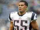 Junior Seau, seen here playing for the New England Patriots toward the end of his career, suffered from a degenerative brain disease, scientists say.