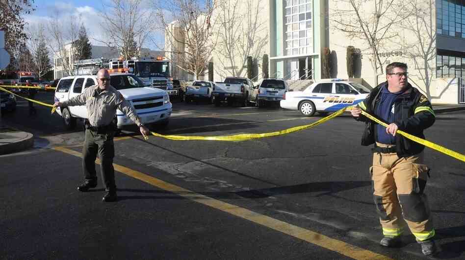 An area is cordoned off outside Taft Union High School in Taft, Calif., Thursday. Authorities said a student was shot and wounded and another student was taken into custody.