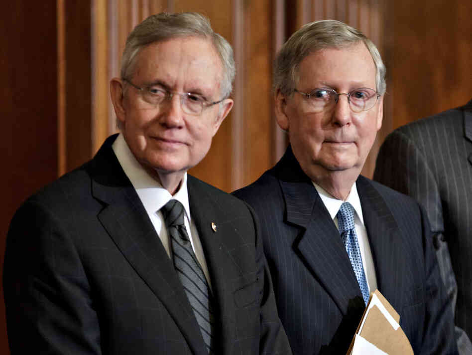 Senate Majority Leader Harry Reid, D-Nev., left, and Senate Minority Leader Mitch McConnell, R-Ky., have talked about a deal to change the Senate's filibuster rules.