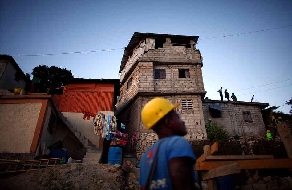 This flimsy three-story house, which was rebuilt after the earthquake in January 2010, will have to be demolished to make way for an 18-unit housing project. Many homes that were rebuilt after the quake are even more dangerous than the original ones.