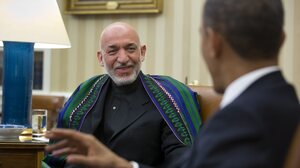 Afghan President Hamid Karzai smiled as President Obama gestured earlier today in the Oval Office.