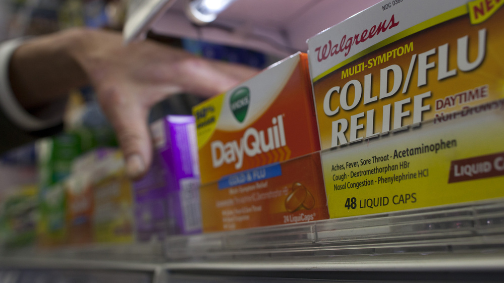 Reaching for relief: A customer at a pharmacy in New York City was grabbing some medicine on Thursday. Reaching for relief: A customer at a pharmacy in New York City was grabbing some medicine on Thursday.