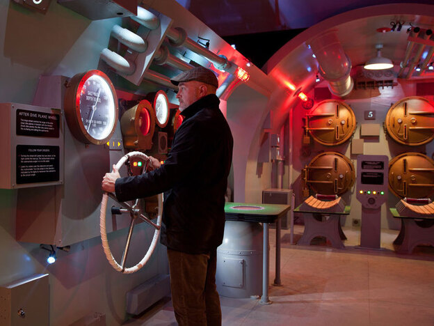 A visitor learns about the USS Tang's doomed final mission at the museum.