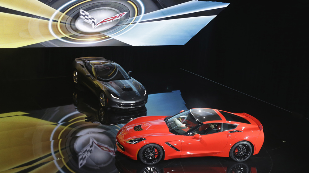 The newly redesigned Corvette Stingray is unveiled by General Motors in a formal industrial complex on Sunday.