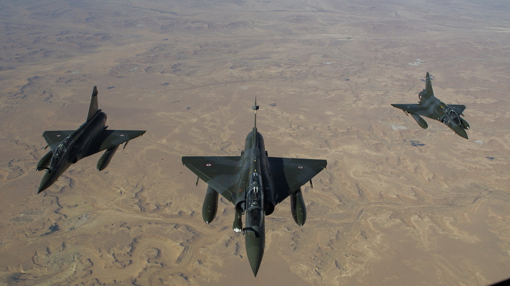 This photo, released on Saturday by the French Army Communications Audiovisual office (ECPAD), shows French Mirage 2000 D jets flying over Mali.