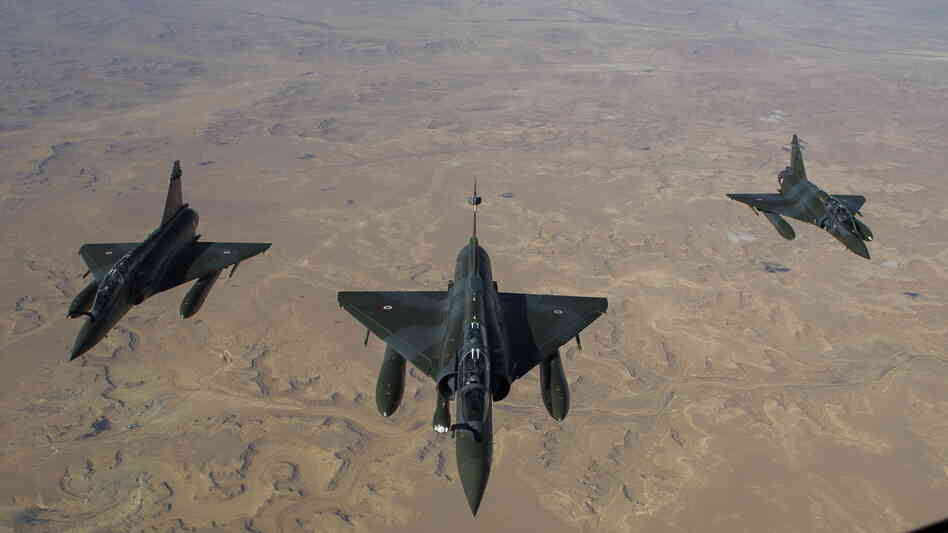 This photo, released on Saturday by the French Army Communications Audiovisual office (ECPAD), shows French Mirage 2000 D jets flying over Mali.