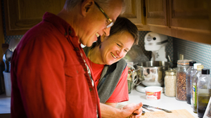 Mike Bixby and Maria Peyer at their home in Longview, Wash. They have been married for two and half years but have known each other since 1981. Peyer is a church-attending Lutheran, and Bixby is an atheist.