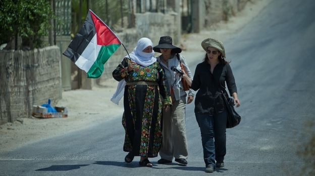 NPR correspondent Lourdes Garcia-Navarro (right) conducts an interview in the West Bank.