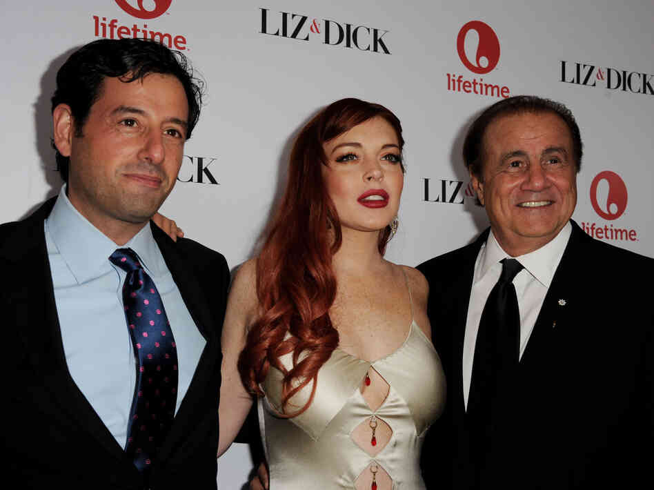 Producer Larry Thompson (right) took out incarceration insurance on Lindsay Lohan for her role in Lifetime's Liz and Dick. Producer Larry Thompson (right) took out incarceration insurance on Lindsay Lohan for her role in Lifetime's Liz and Dick.