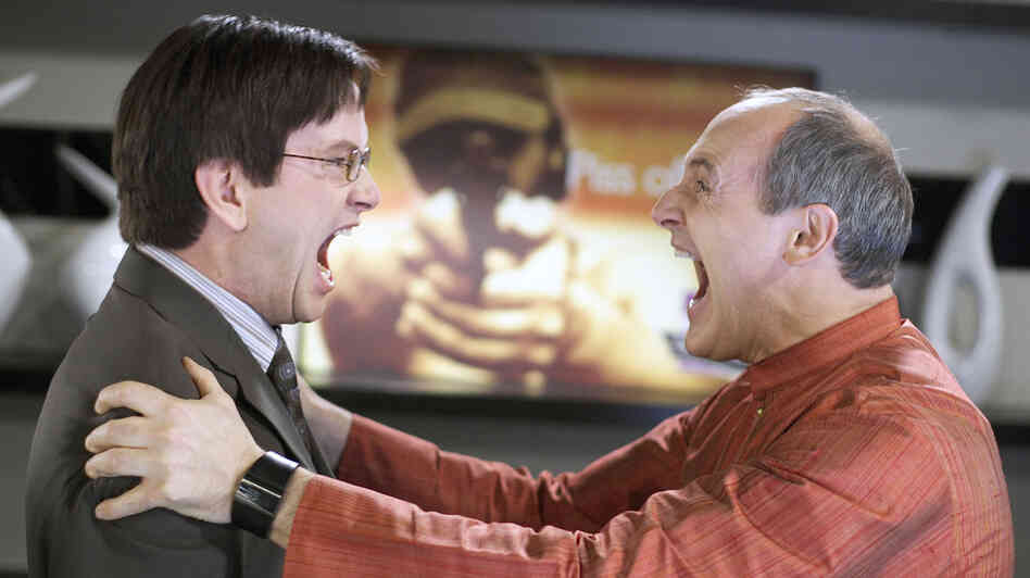 Richard (Mark McKinney) and Sanjay (Colm Feore) get up close and personal in the zany backstage comedy Slings and Arrows. Richard (Mark McKinney) and Sanjay (Colm Feore) get up close and personal in the zany backstage comedy Slings and Arrows.