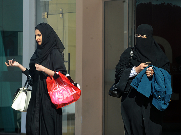 Saudi women leave a shopping mall in the capital, Riyadh, on Saturday. King Abdullah has introduced a number of reforms for women during his rule, but they still face many restrictions.