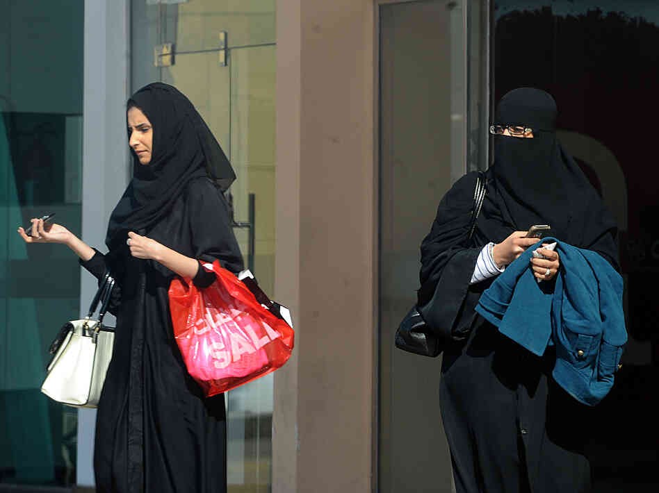 Saudi women leave a shopping mall in the capital, Riyadh, on Saturday. King Abdullah has introduced a number of reforms for women during his rule, but they still face many restrictions.