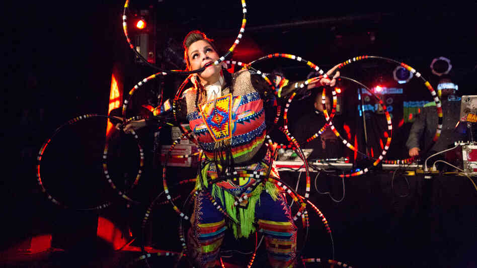 A hooper dances to Canadian electronic group A Tribe Called Red at globalFEST 2013. A hooper dances to Canadian electronic group A Tribe Called Red at globalFEST 2013.