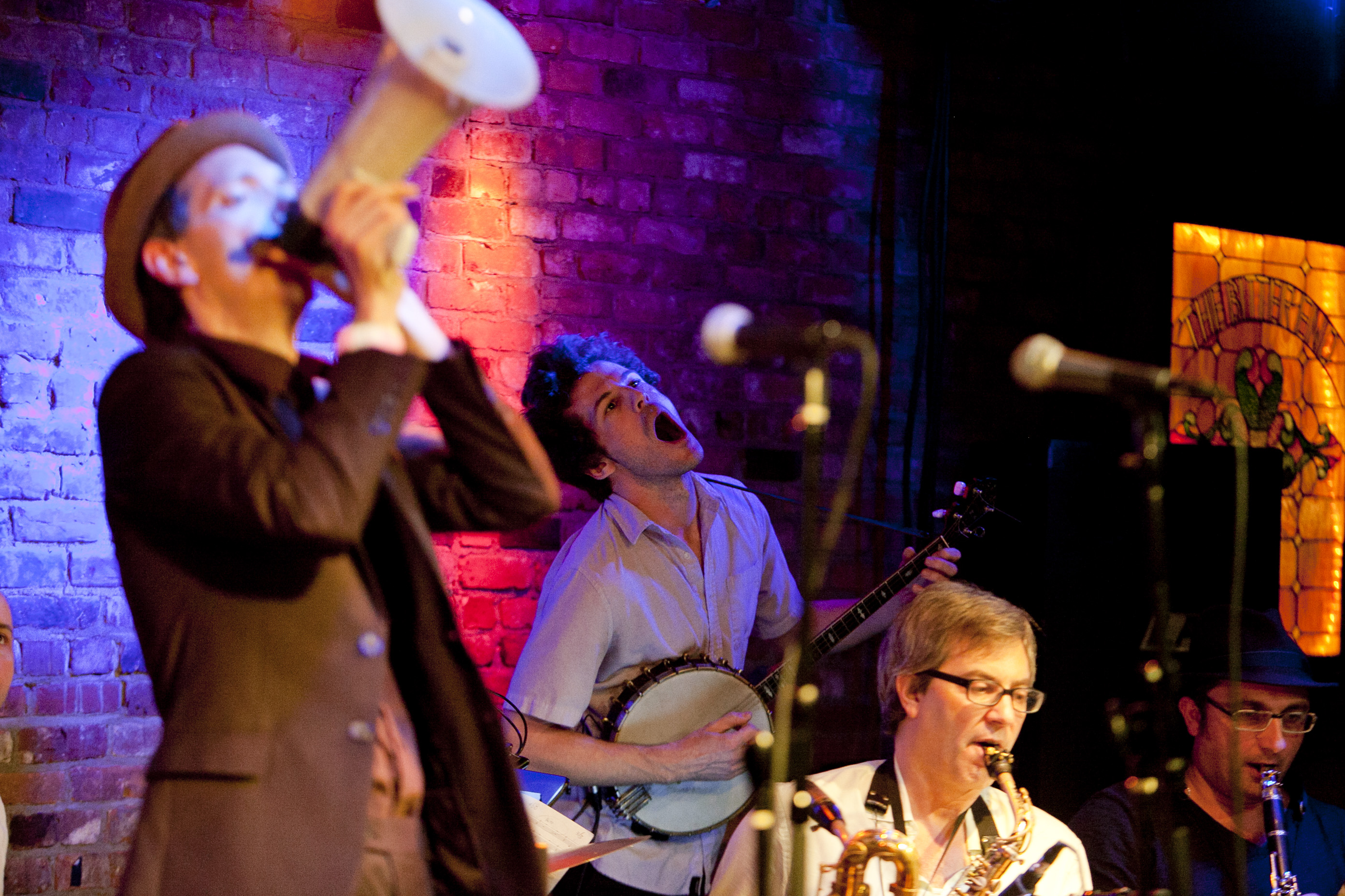 Banjo player Brandon Seabrook was one of the animators of the early jazz ensemble Ghost Train Orchestra, led by Brian Carpenter (left).
