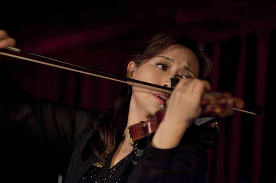 Violinist Meg Okura led what she called a Pan Asian Chamber Jazz Ensemble in a program of compositions by Ryuichi Sakamoto.