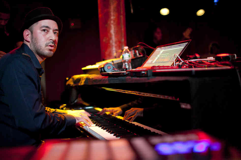Mark de Clive-Lowe led his band on piano, keyboards and electronics.