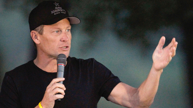 Cyclist Lance Armstrong addresses participants at a Livestrong event in October. (Getty Images)