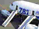An All Nippon Airways flight sits at Takamatsu airport in Takamatsu, Japan, after it made an emergency landing Wednesday. An All Nippon Airways flight sits at Takamatsu airport in Takamatsu, Japan, after it made an emergency landing Wednesday.