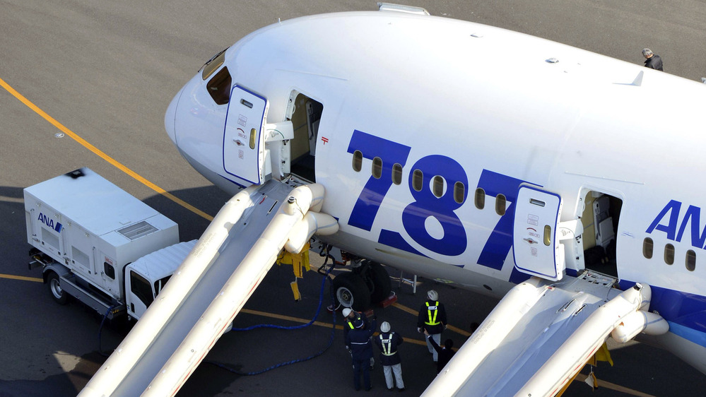 An All Nippon Airways flight sits at Takamatsu airport in Takamatsu, Japan, after it made an emergency landing Wednesday. An All Nippon Airways flight sits at Takamatsu airport in Takamatsu, Japan, after it made an emergency landing Wednesday.
