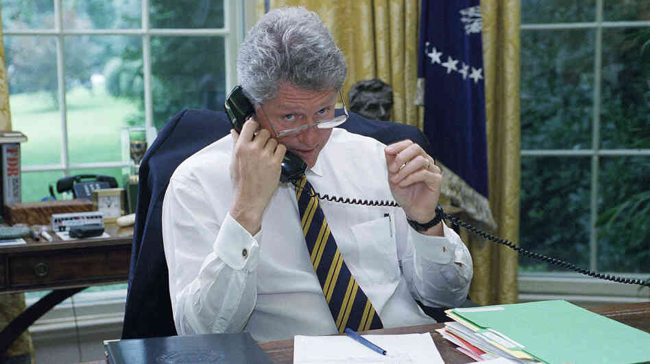 President Clinton speaks to a member of the House on Aug. 11, 1994, lobbying for votes for the crime bill.