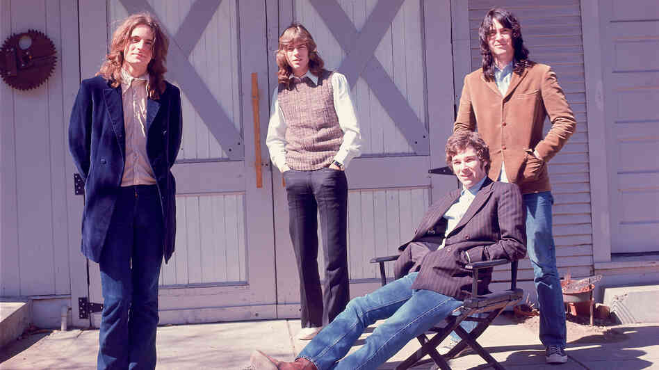 Big Star's members pose in front of their barn.