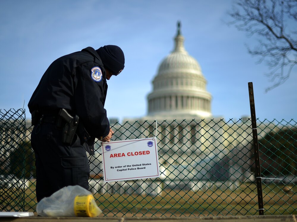 A US Capitol Policeman secures the area surrounding the west front of the US Capitol in Washington, D.C., on Jan. 5, 2013 as preparation are underway for U.S. President Barack Obama's second inauguration. A US Capitol Policeman secures the area surrounding the west front of the US Capitol in Washington, D.C., on Jan. 5, 2013 as preparation are underway for U.S. President Barack Obama's second inauguration.