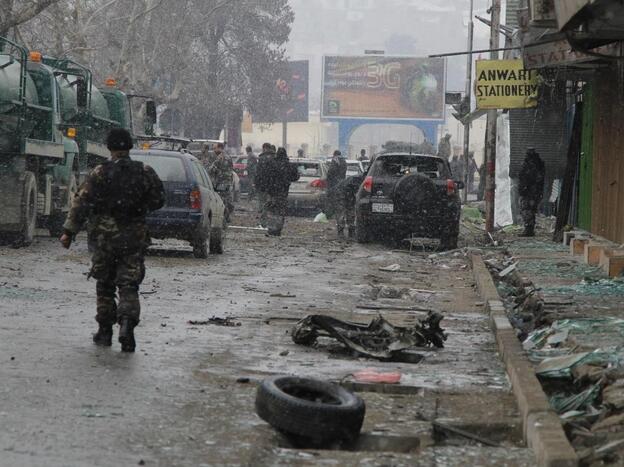 Debris littered the street at the scene of today's attack in Kabul.
